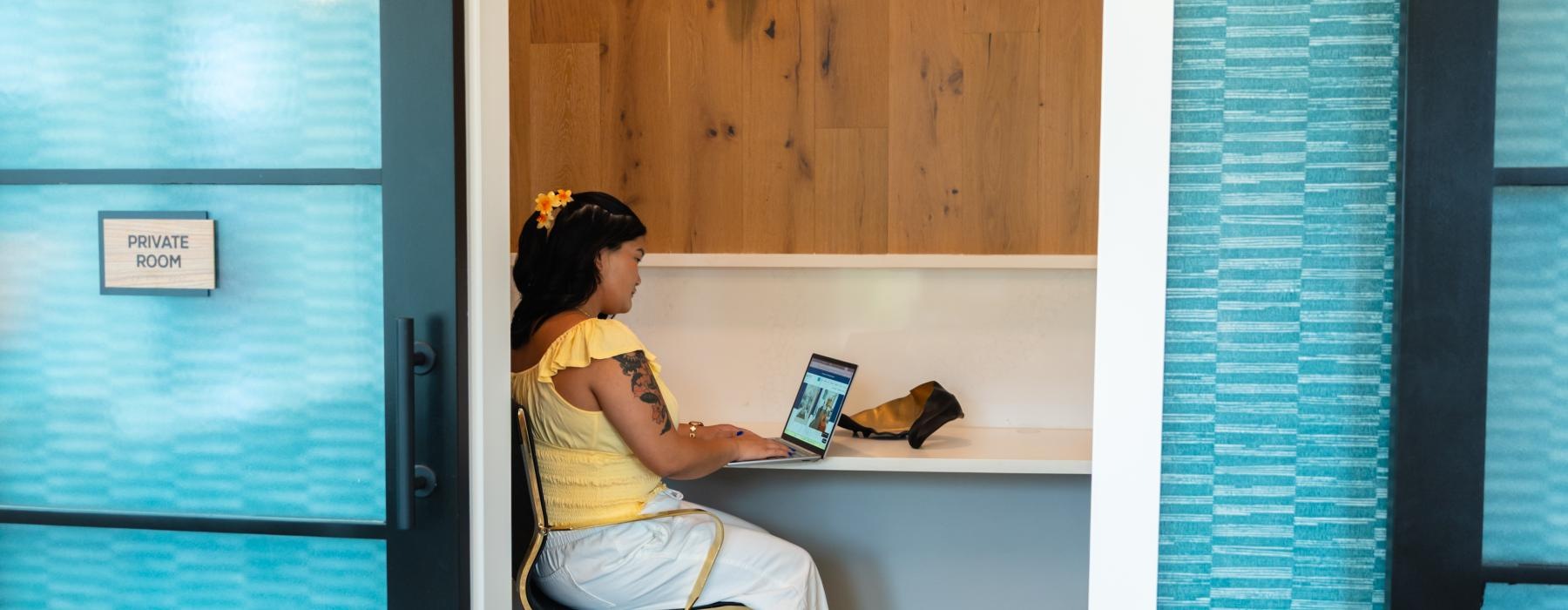 a person sitting in a study area