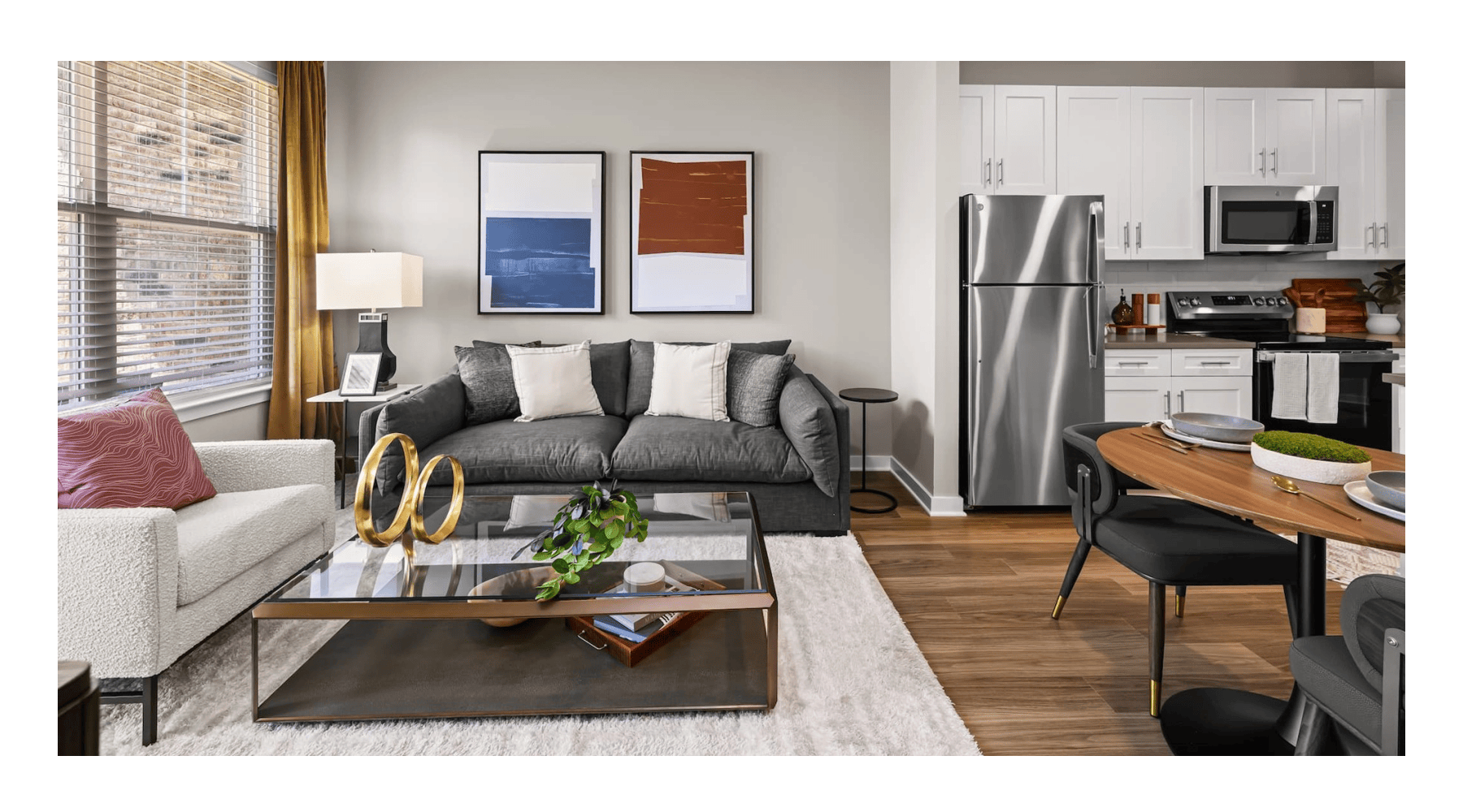 living room with a large window and open spaces